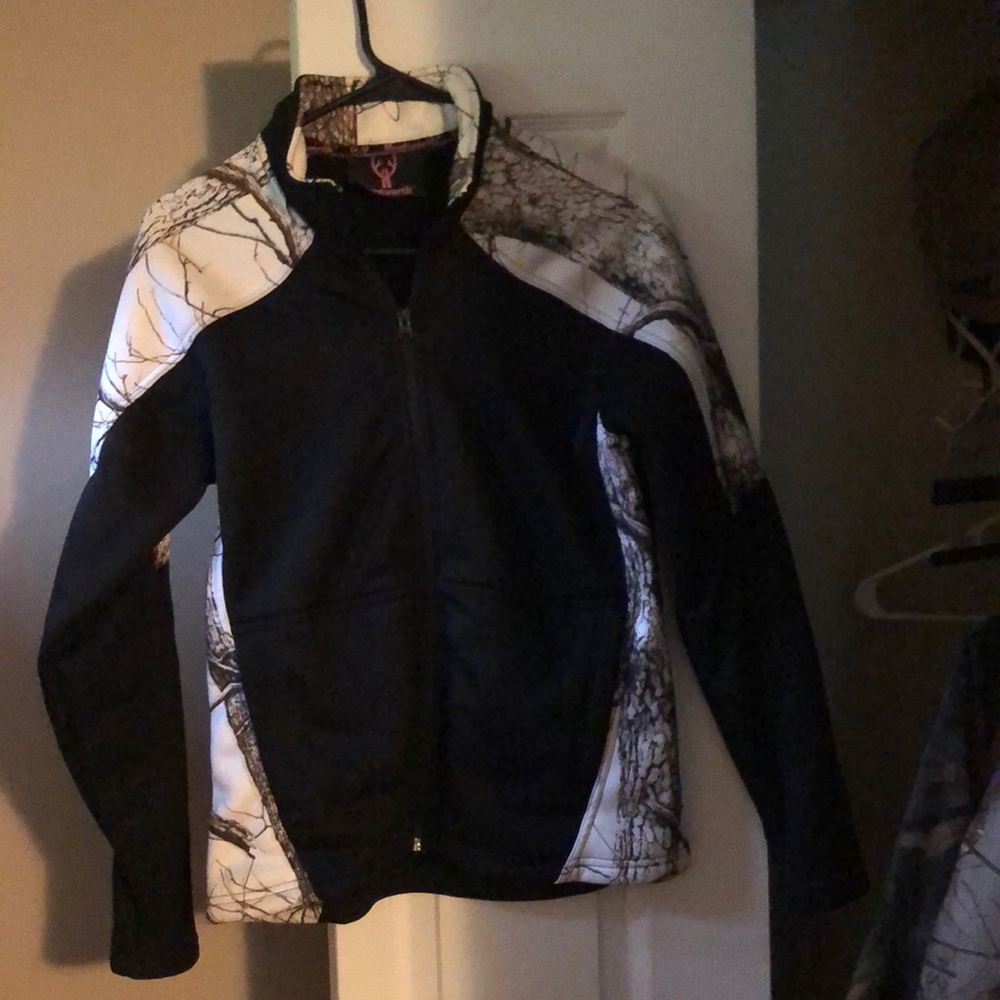 Like new winter camo woman’s jacket